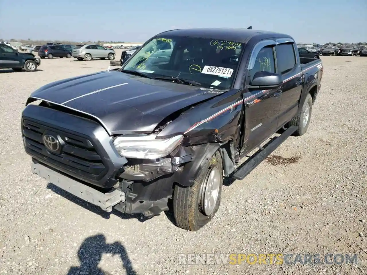 2 Photograph of a damaged car 5TFAX5GN2KX137885 TOYOTA TACOMA 2019