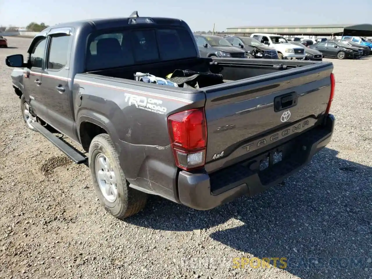 3 Photograph of a damaged car 5TFAX5GN2KX137885 TOYOTA TACOMA 2019