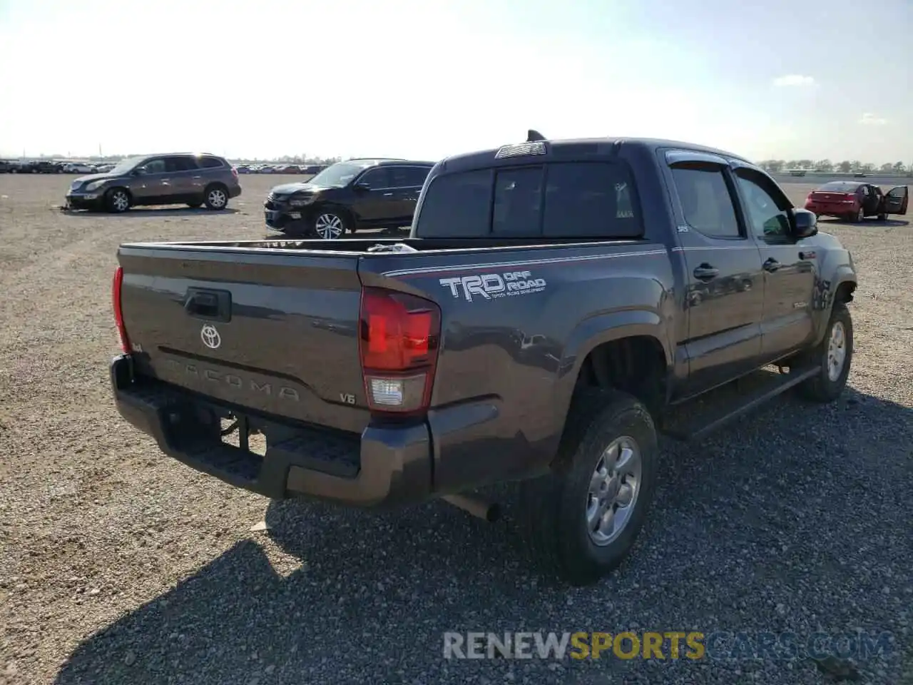 4 Photograph of a damaged car 5TFAX5GN2KX137885 TOYOTA TACOMA 2019