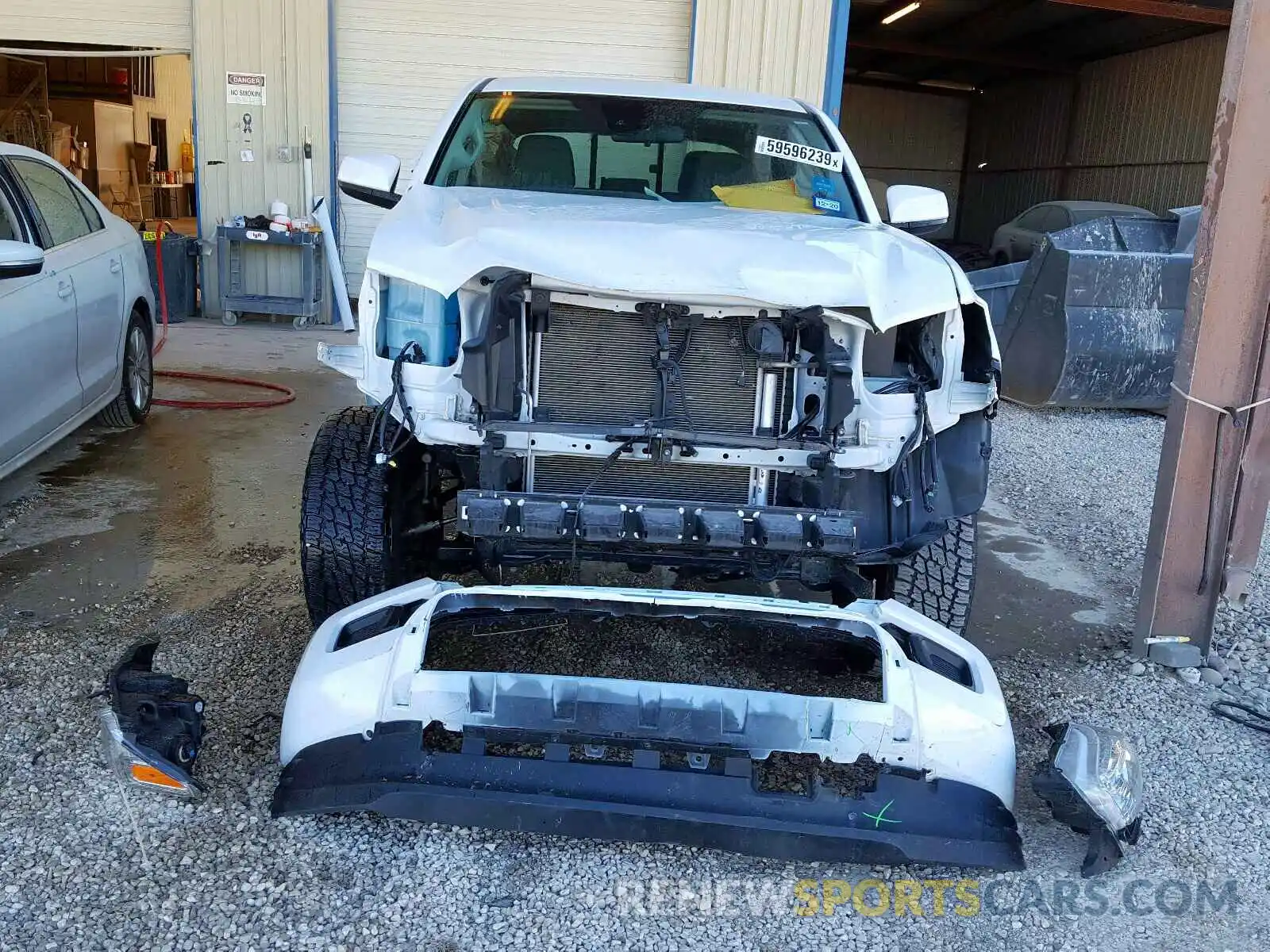 9 Photograph of a damaged car 5TFAX5GN2KX141211 TOYOTA TACOMA 2019