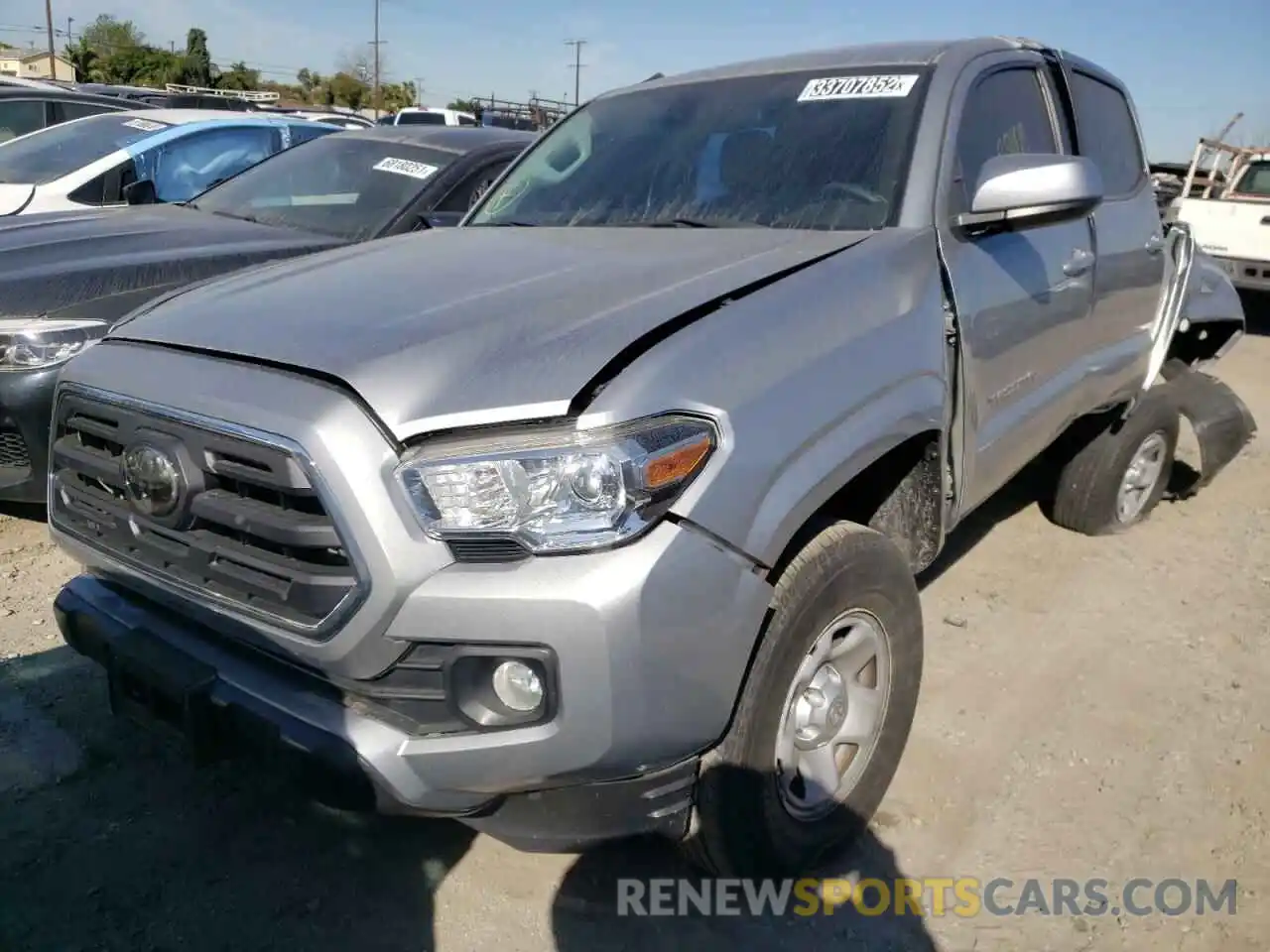 2 Photograph of a damaged car 5TFAX5GN2KX141841 TOYOTA TACOMA 2019