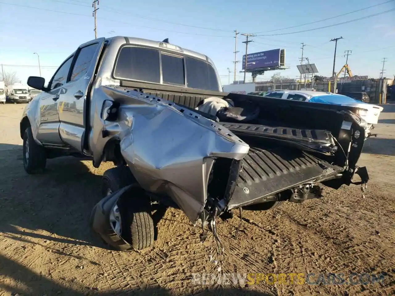 3 Photograph of a damaged car 5TFAX5GN2KX141841 TOYOTA TACOMA 2019