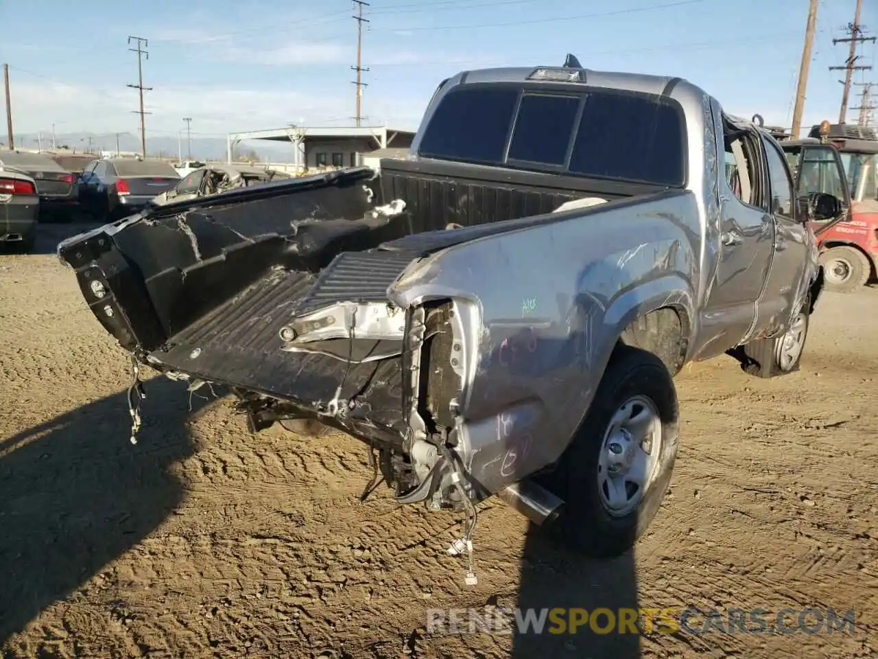 4 Photograph of a damaged car 5TFAX5GN2KX141841 TOYOTA TACOMA 2019