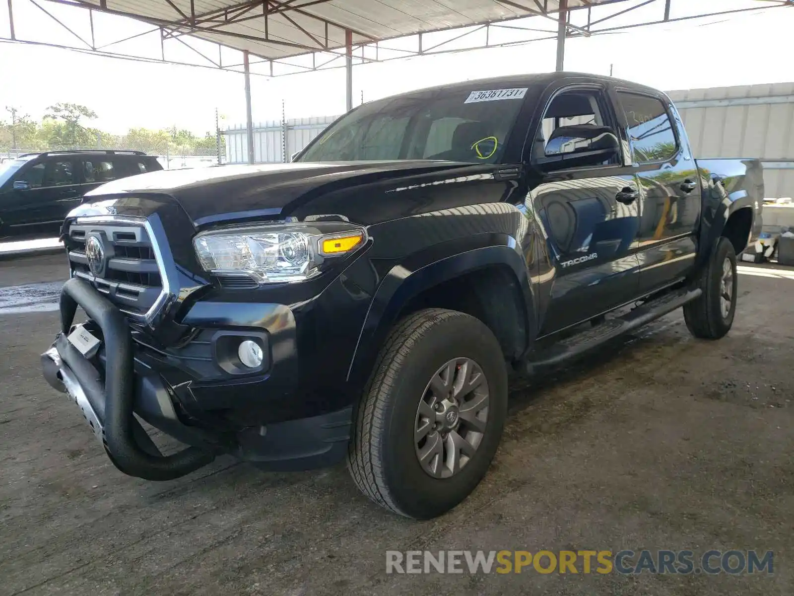 2 Photograph of a damaged car 5TFAX5GN2KX144996 TOYOTA TACOMA 2019