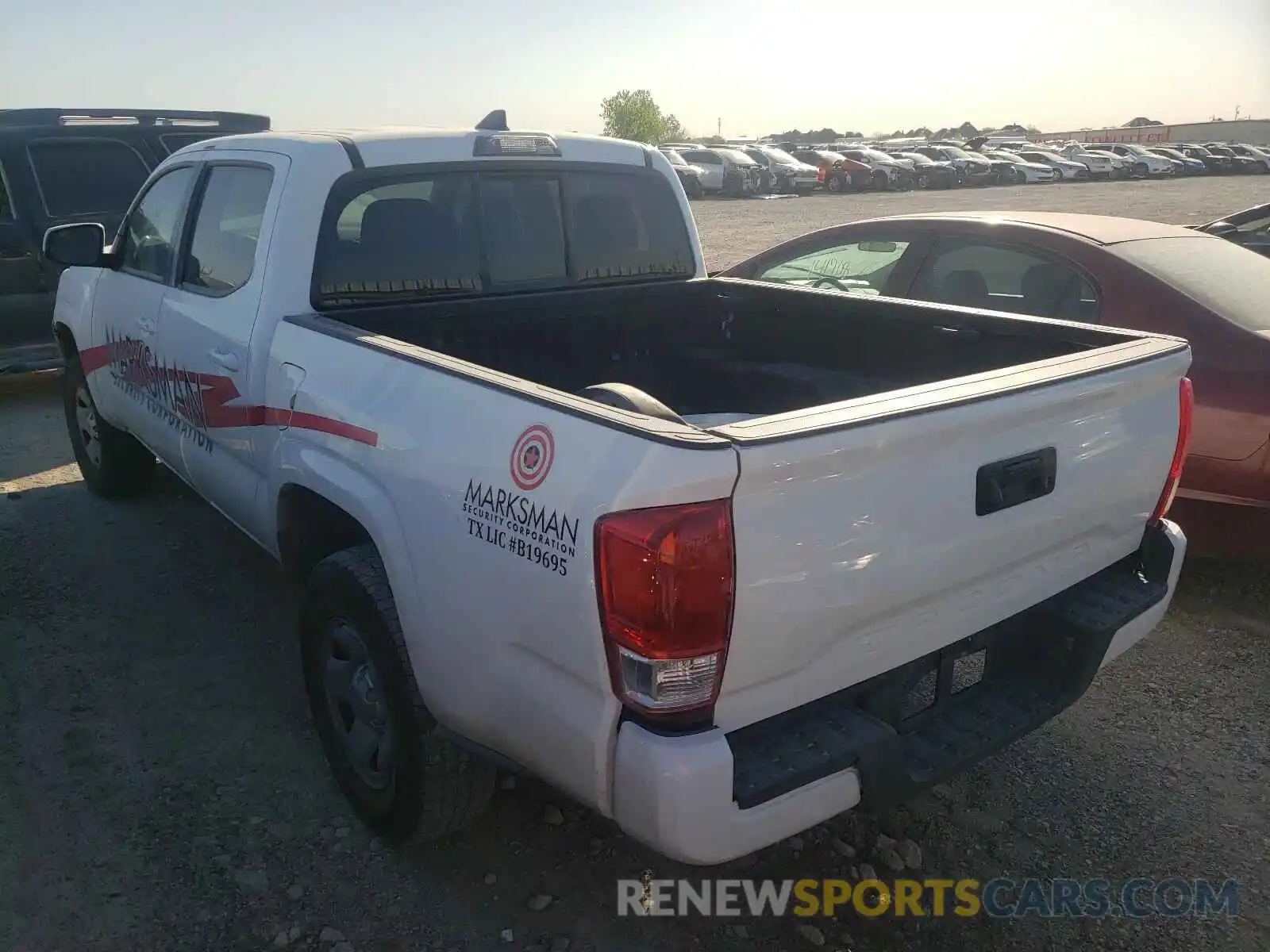 3 Photograph of a damaged car 5TFAX5GN2KX145713 TOYOTA TACOMA 2019