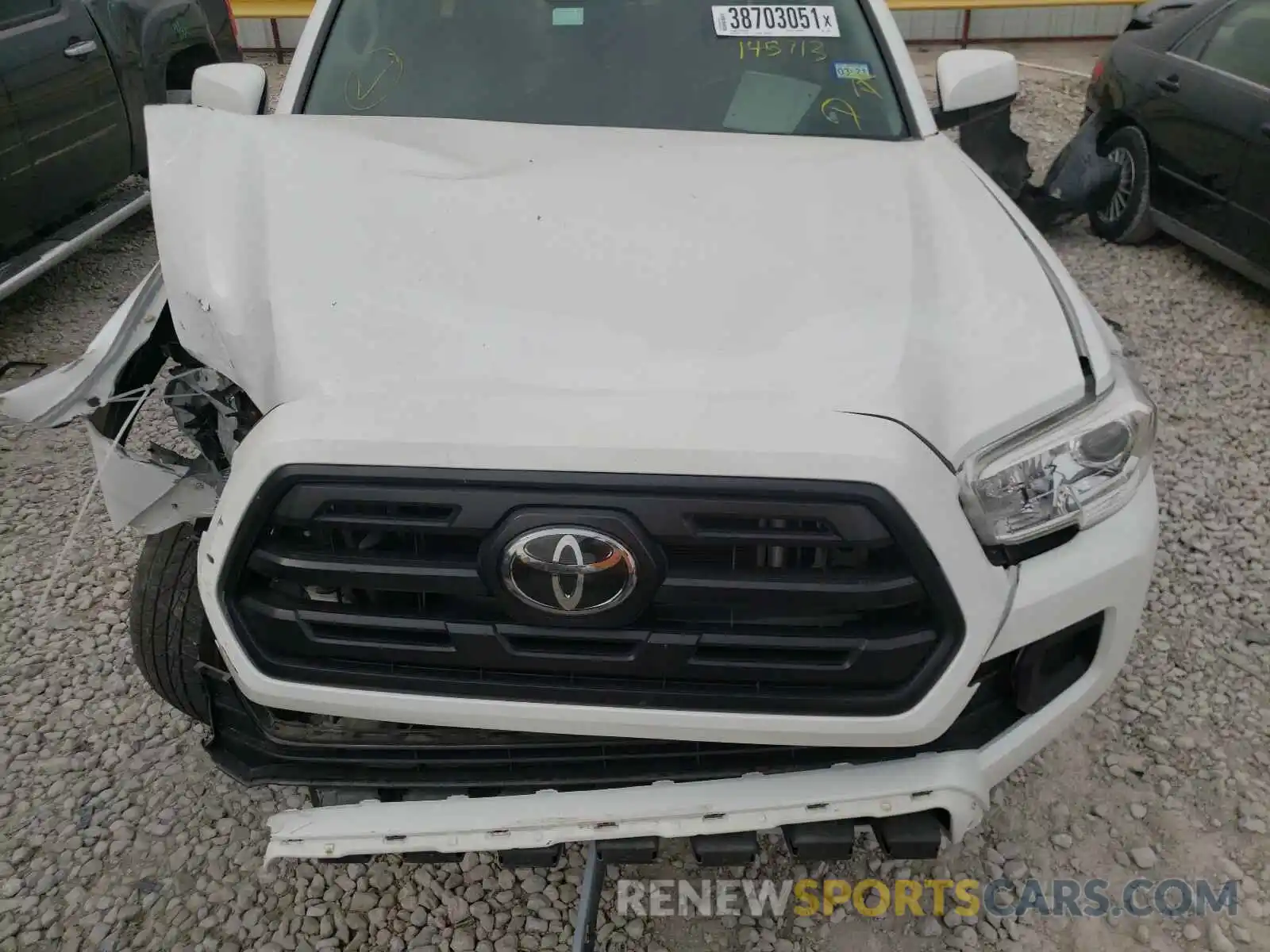 7 Photograph of a damaged car 5TFAX5GN2KX145713 TOYOTA TACOMA 2019