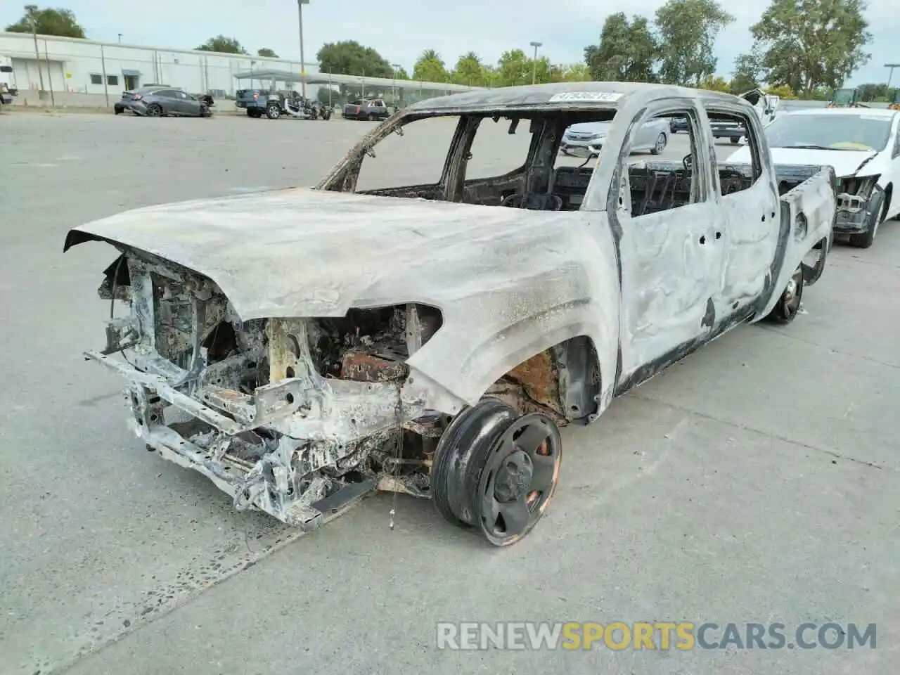 2 Photograph of a damaged car 5TFAX5GN2KX148613 TOYOTA TACOMA 2019