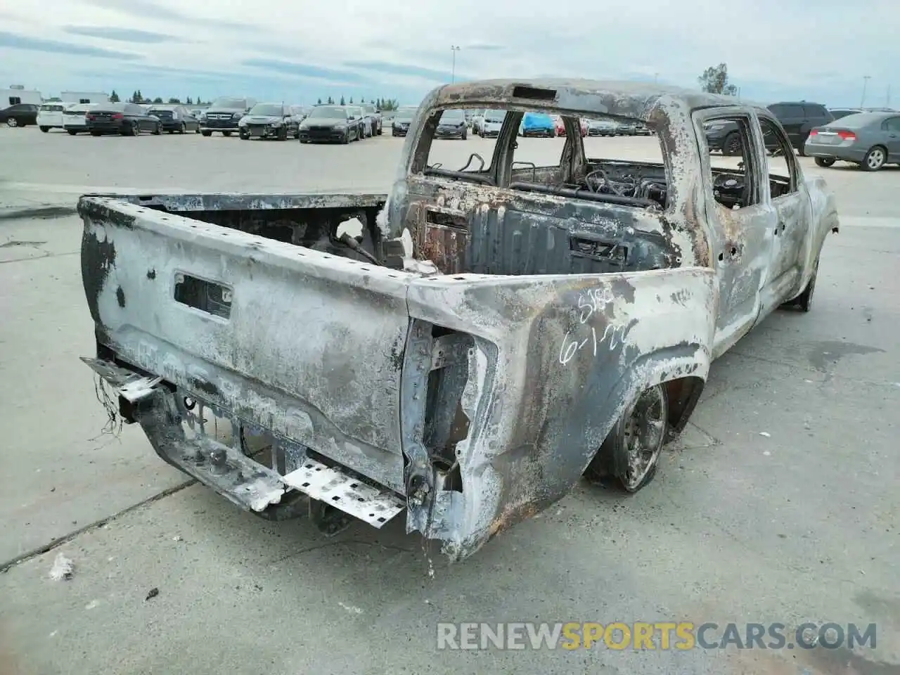 4 Photograph of a damaged car 5TFAX5GN2KX148613 TOYOTA TACOMA 2019