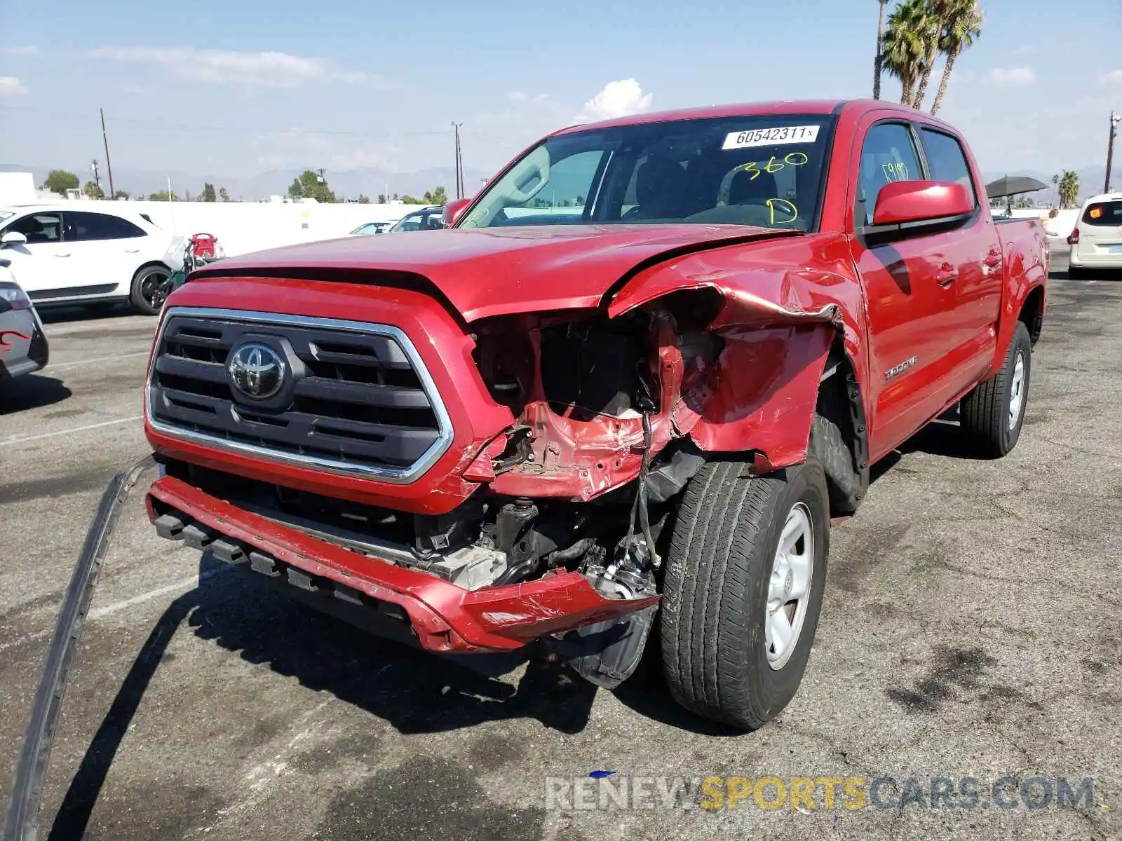 2 Photograph of a damaged car 5TFAX5GN2KX150975 TOYOTA TACOMA 2019