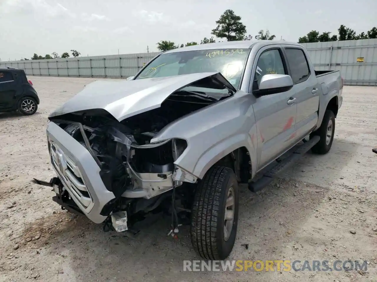 2 Photograph of a damaged car 5TFAX5GN2KX151124 TOYOTA TACOMA 2019