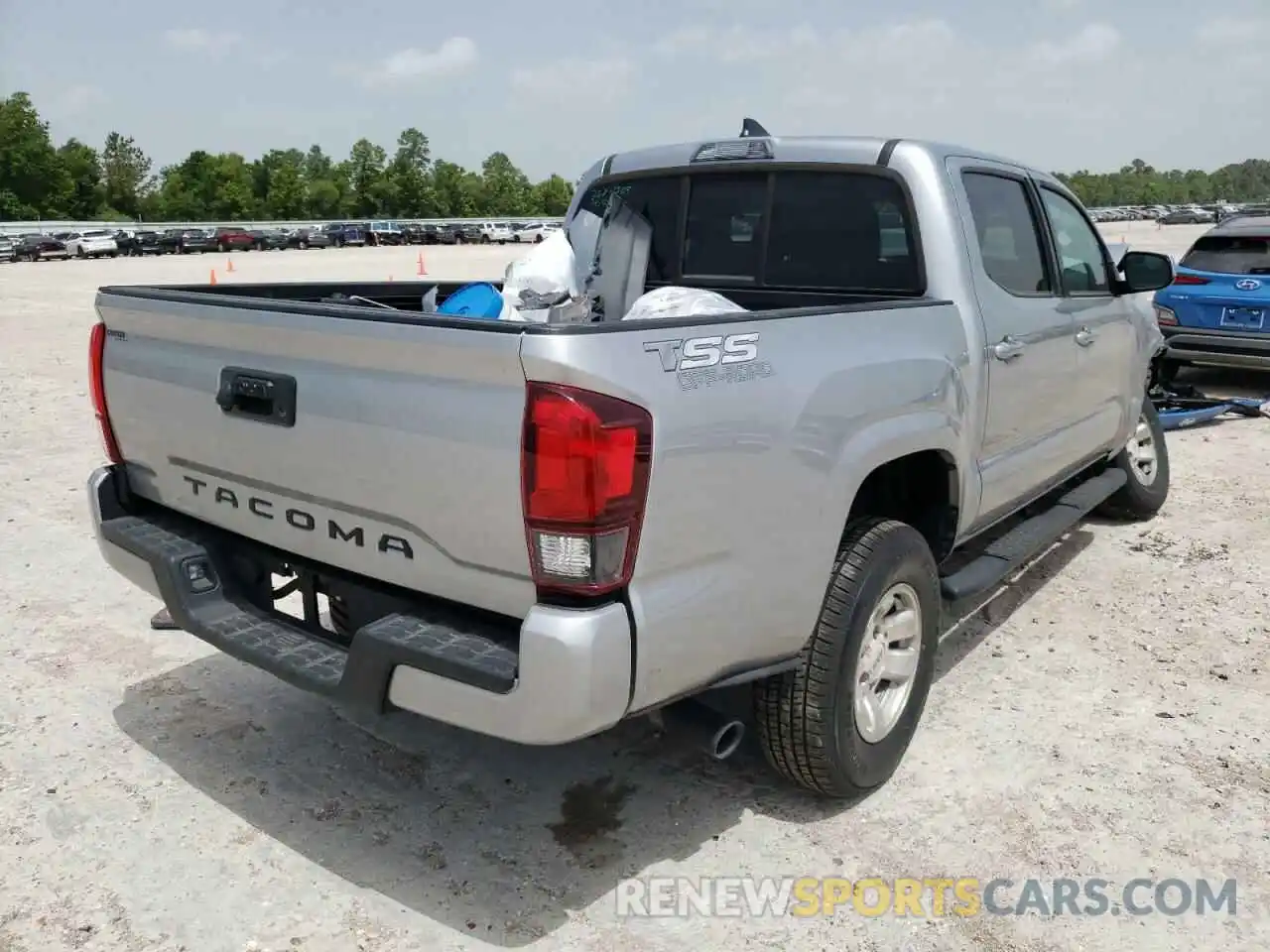 4 Photograph of a damaged car 5TFAX5GN2KX151124 TOYOTA TACOMA 2019