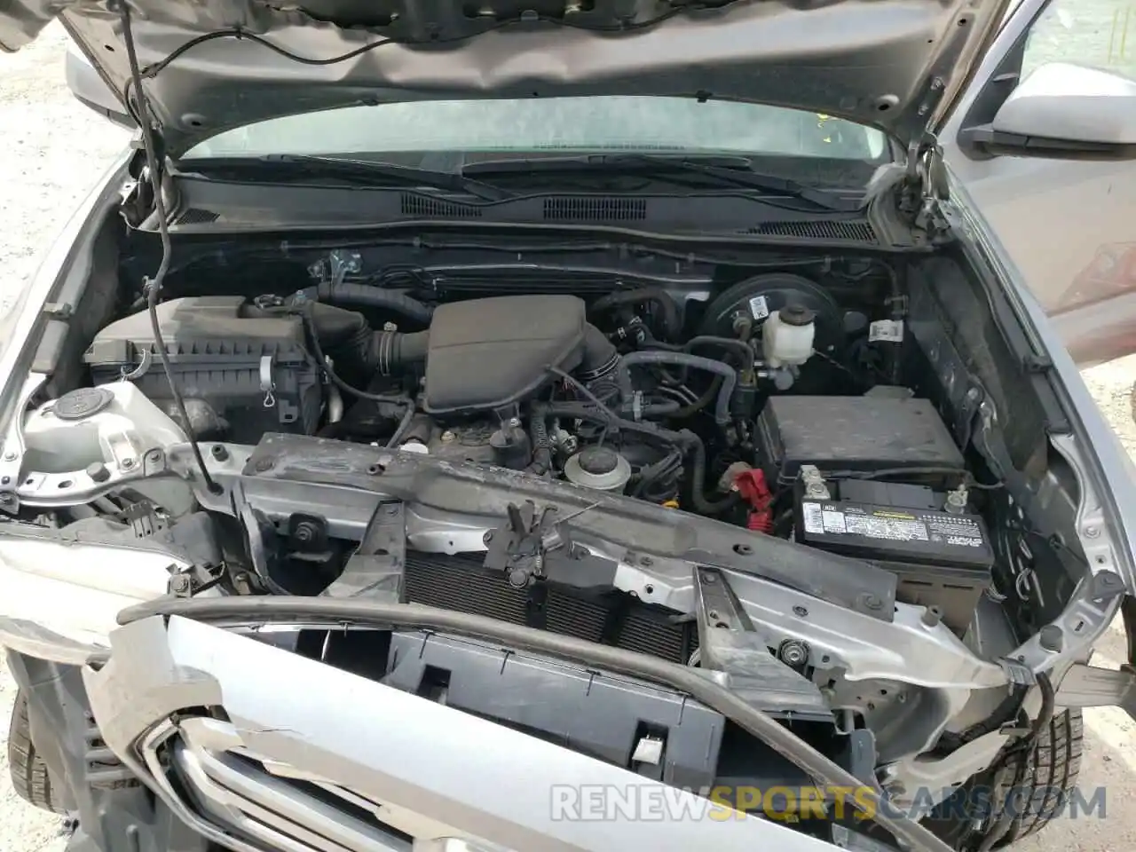 7 Photograph of a damaged car 5TFAX5GN2KX151124 TOYOTA TACOMA 2019