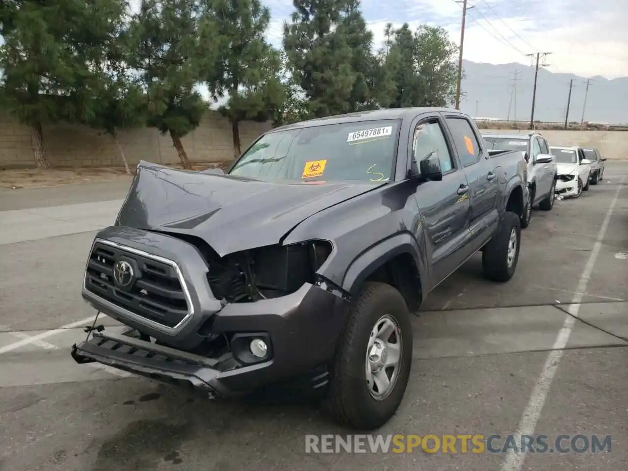 2 Photograph of a damaged car 5TFAX5GN2KX152144 TOYOTA TACOMA 2019