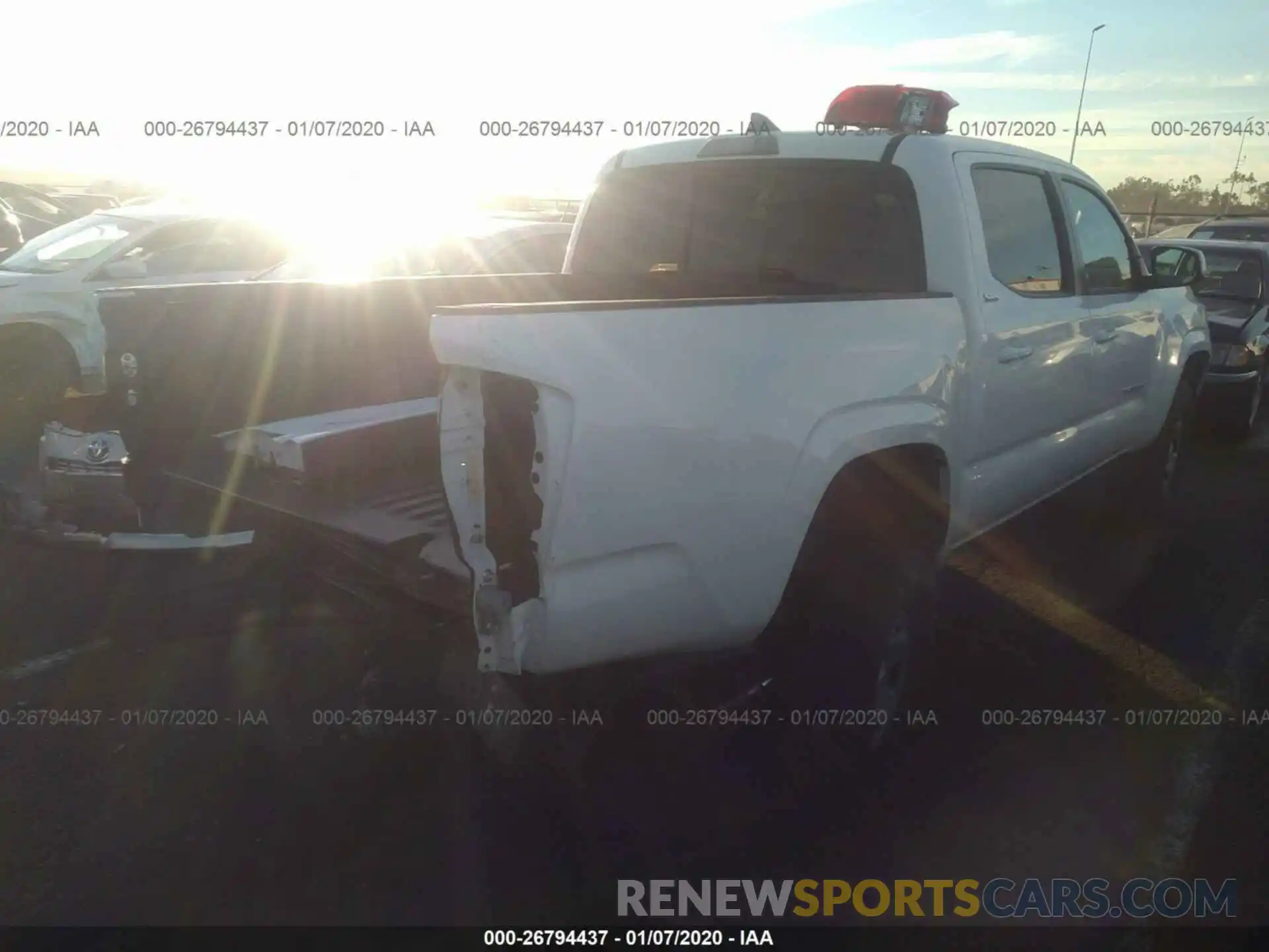 4 Photograph of a damaged car 5TFAX5GN2KX154184 TOYOTA TACOMA 2019