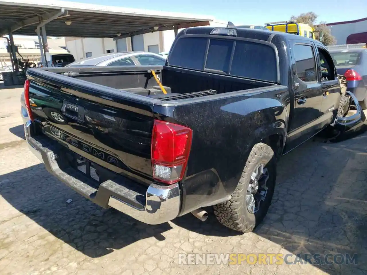 4 Photograph of a damaged car 5TFAX5GN2KX161085 TOYOTA TACOMA 2019