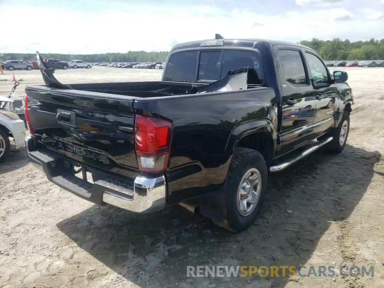 4 Photograph of a damaged car 5TFAX5GN3KX138639 TOYOTA TACOMA 2019