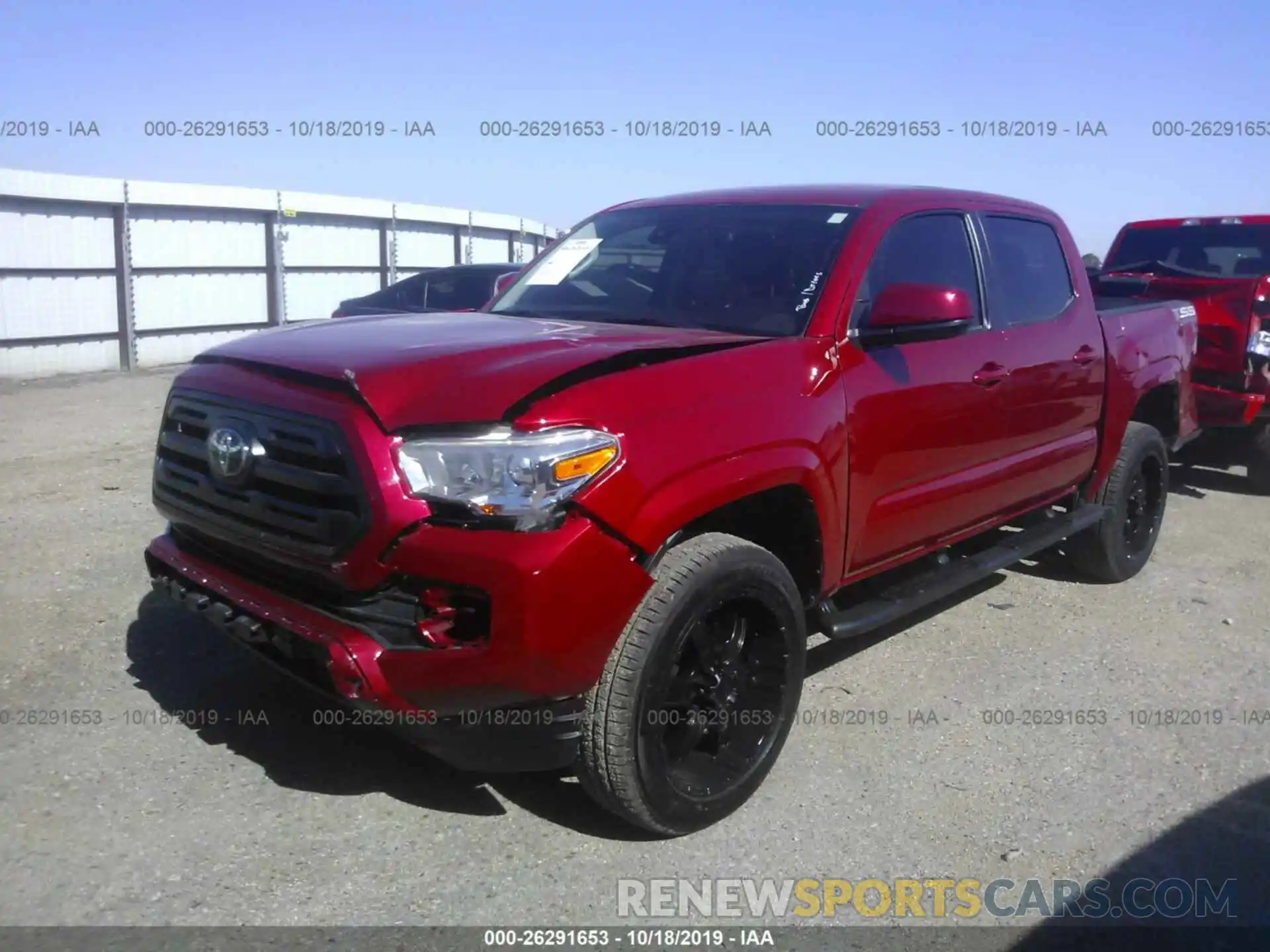 2 Photograph of a damaged car 5TFAX5GN3KX139094 TOYOTA TACOMA 2019