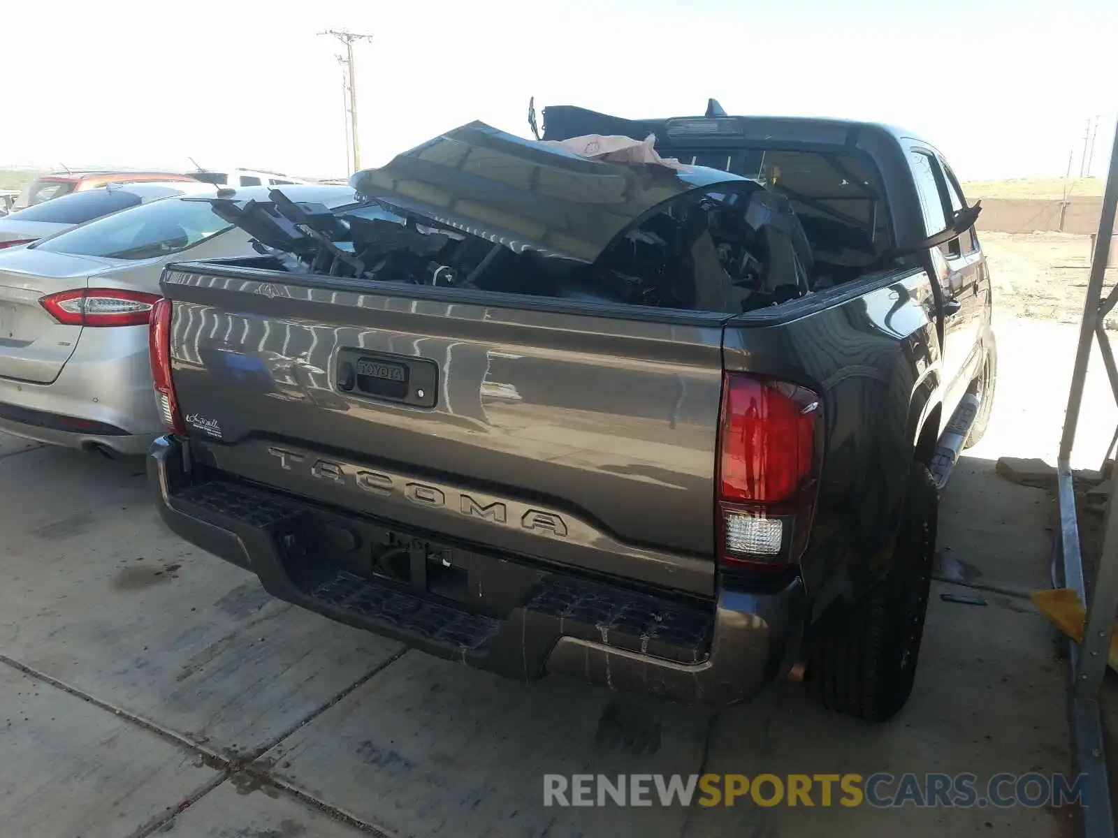 4 Photograph of a damaged car 5TFAX5GN3KX142898 TOYOTA TACOMA 2019