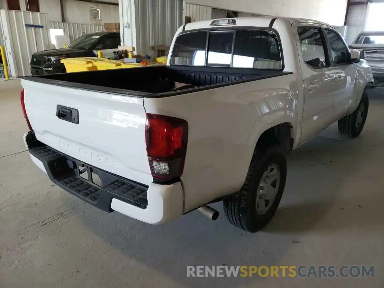 4 Photograph of a damaged car 5TFAX5GN3KX144005 TOYOTA TACOMA 2019