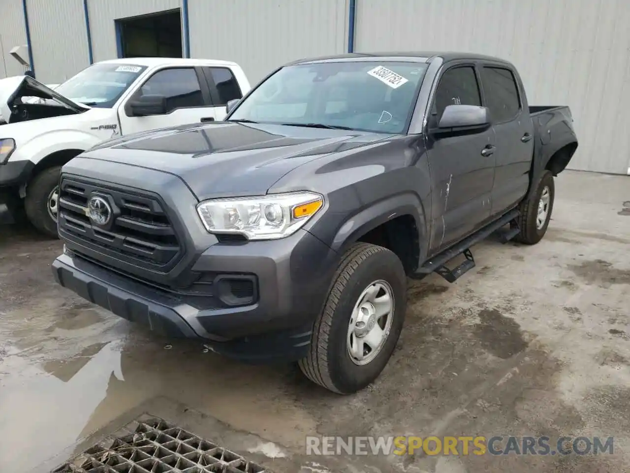 2 Photograph of a damaged car 5TFAX5GN3KX148555 TOYOTA TACOMA 2019