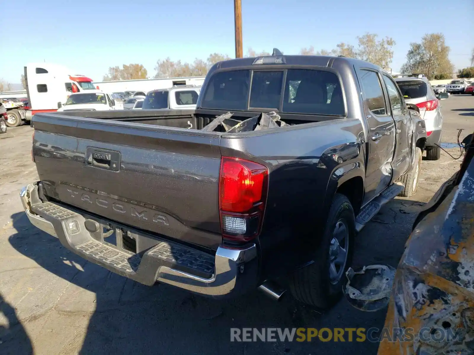 4 Photograph of a damaged car 5TFAX5GN3KX150872 TOYOTA TACOMA 2019