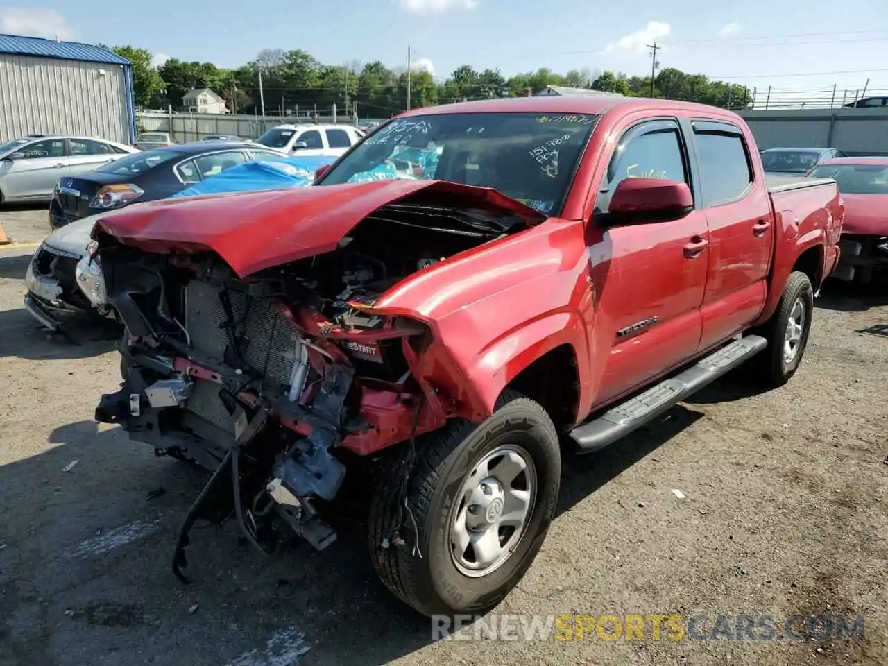 2 Photograph of a damaged car 5TFAX5GN3KX151780 TOYOTA TACOMA 2019