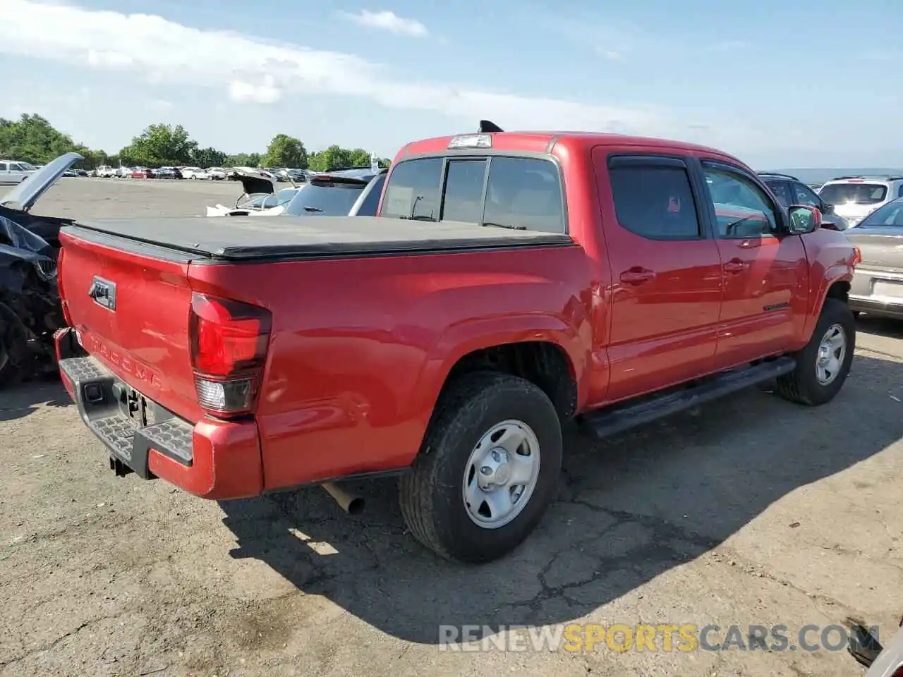 4 Photograph of a damaged car 5TFAX5GN3KX151780 TOYOTA TACOMA 2019