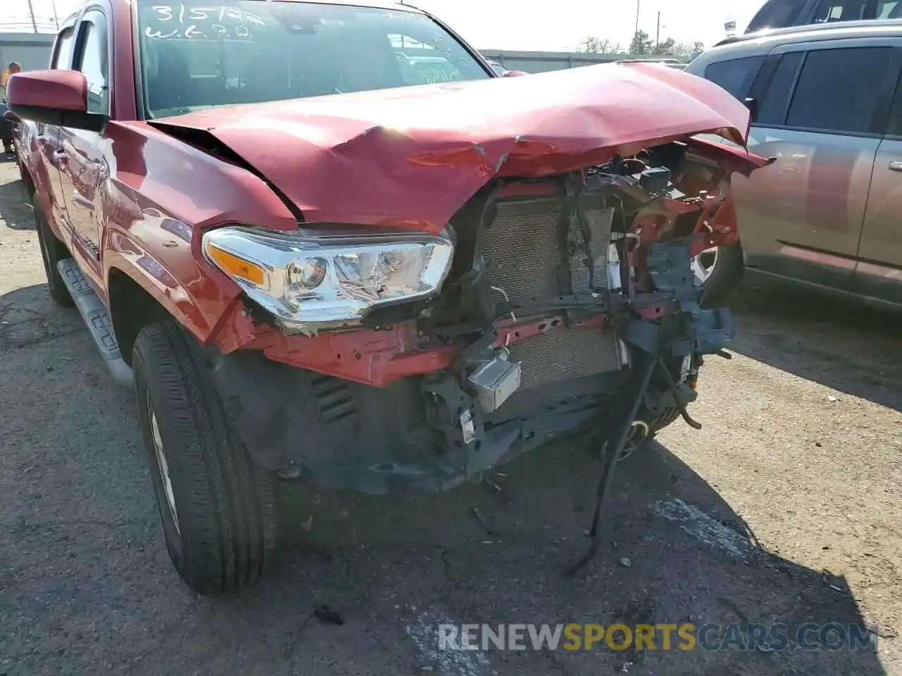 9 Photograph of a damaged car 5TFAX5GN3KX151780 TOYOTA TACOMA 2019