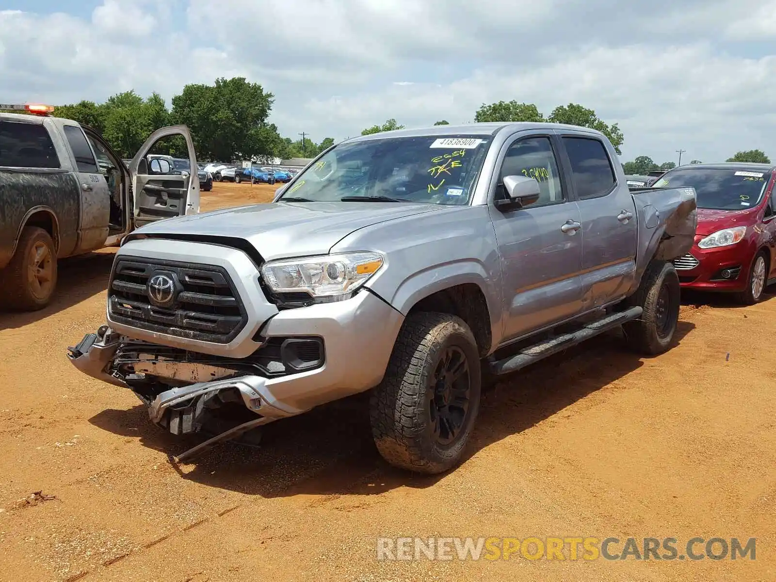 2 Photograph of a damaged car 5TFAX5GN3KX152654 TOYOTA TACOMA 2019