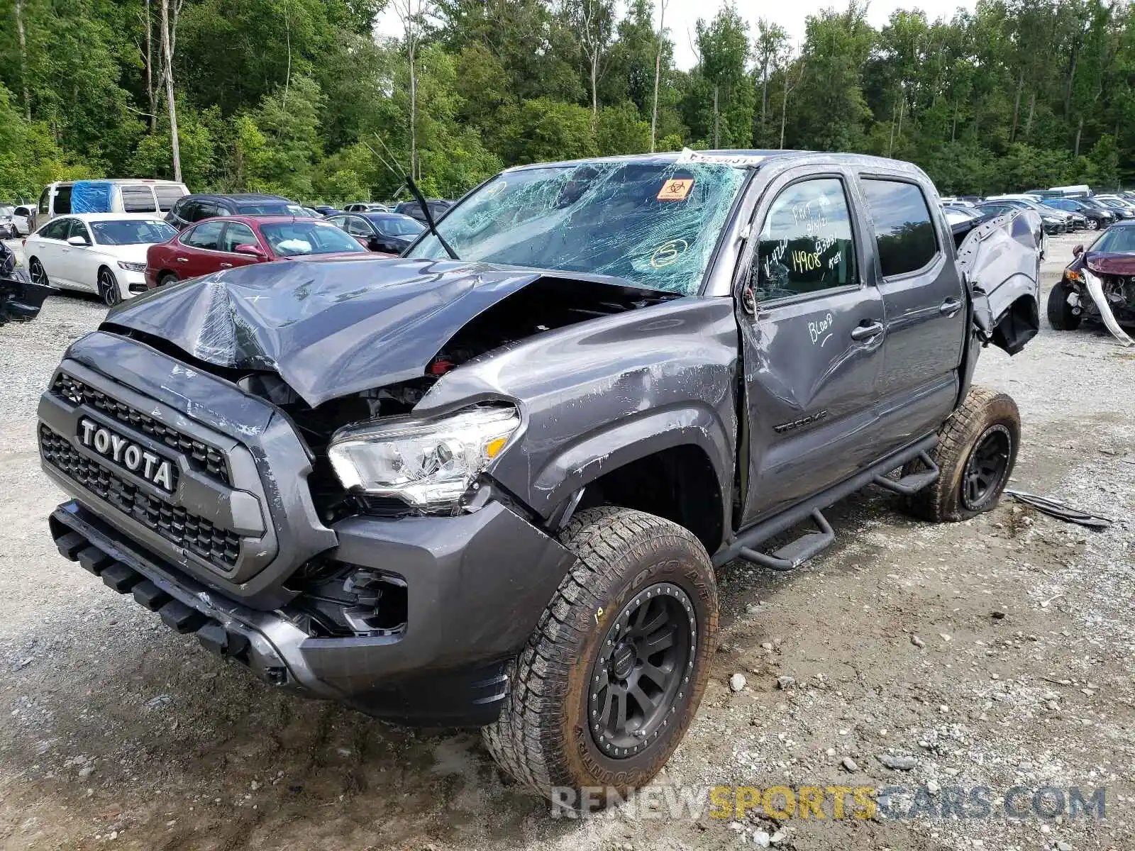 2 Photograph of a damaged car 5TFAX5GN3KX154260 TOYOTA TACOMA 2019