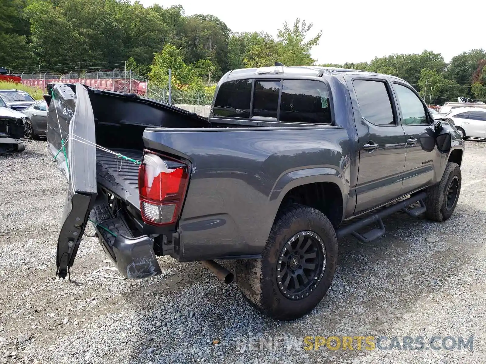 4 Photograph of a damaged car 5TFAX5GN3KX154260 TOYOTA TACOMA 2019