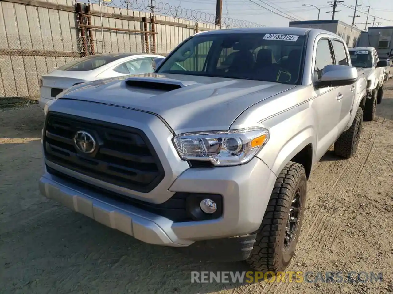 2 Photograph of a damaged car 5TFAX5GN3KX157028 TOYOTA TACOMA 2019