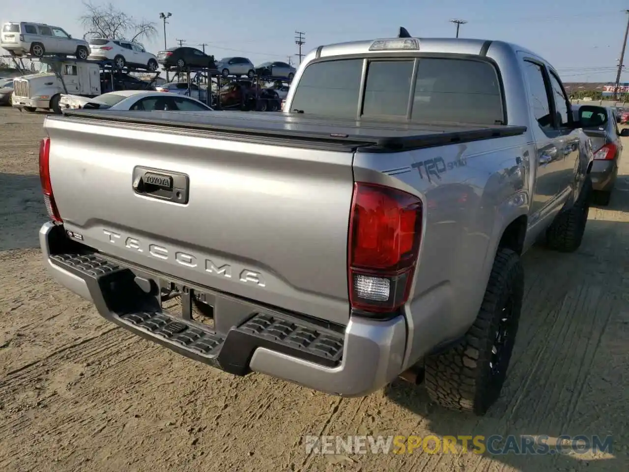 4 Photograph of a damaged car 5TFAX5GN3KX157028 TOYOTA TACOMA 2019