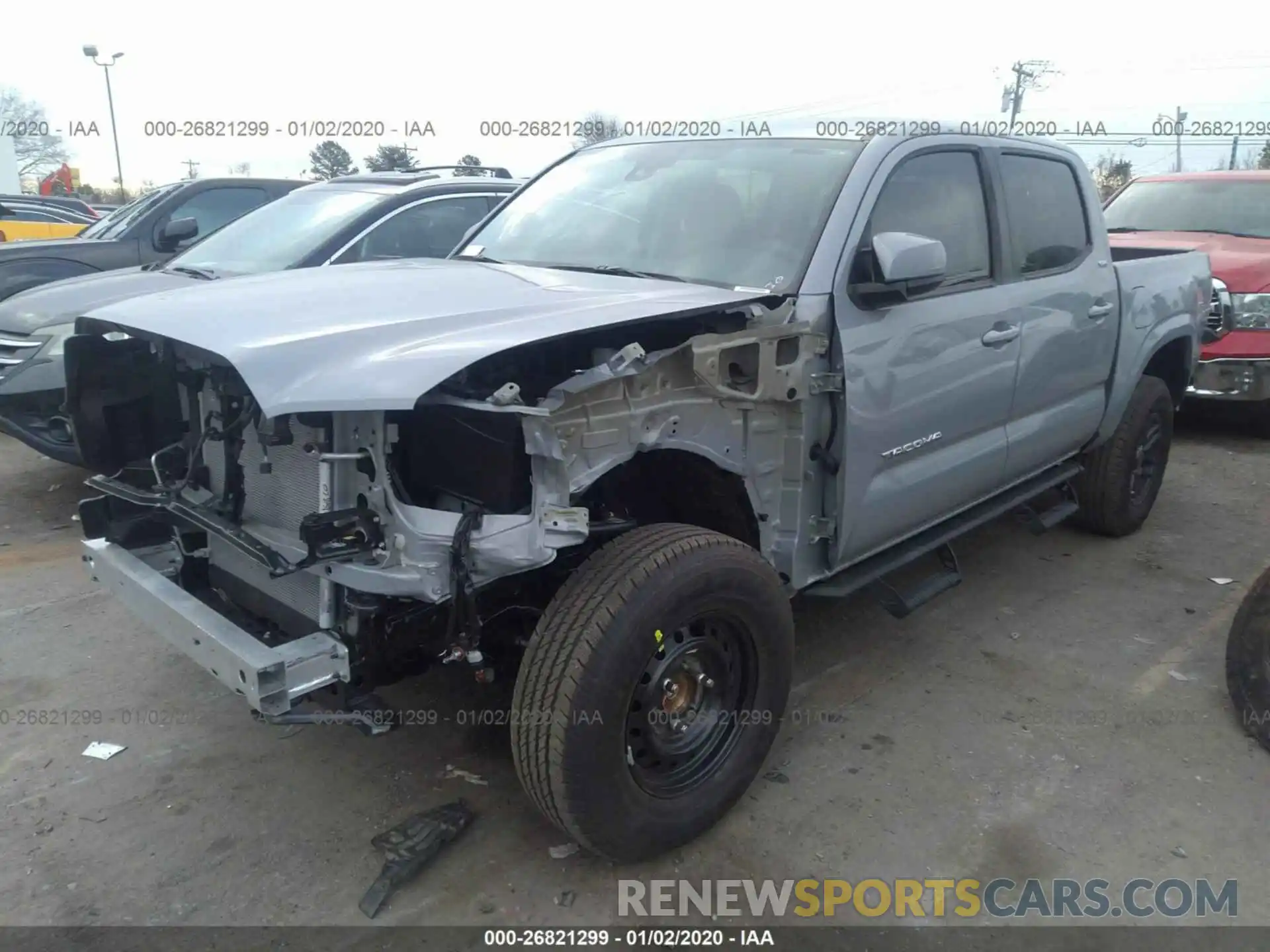 2 Photograph of a damaged car 5TFAX5GN3KX158714 TOYOTA TACOMA 2019