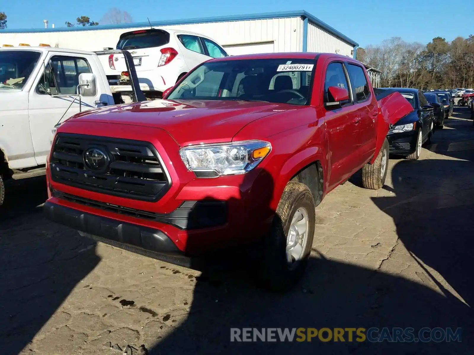 2 Photograph of a damaged car 5TFAX5GN3KX160172 TOYOTA TACOMA 2019