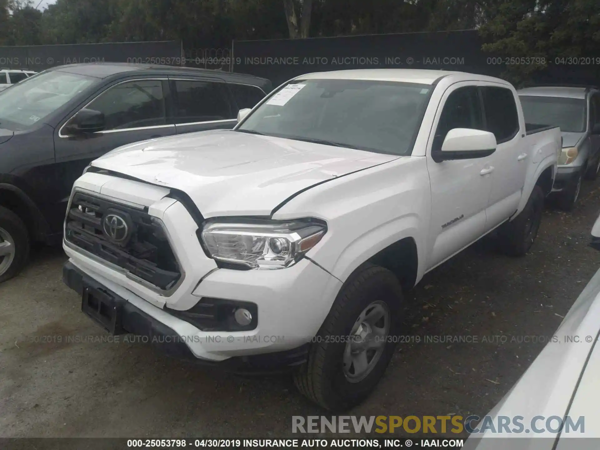 2 Photograph of a damaged car 5TFAX5GN4KX133384 TOYOTA TACOMA 2019