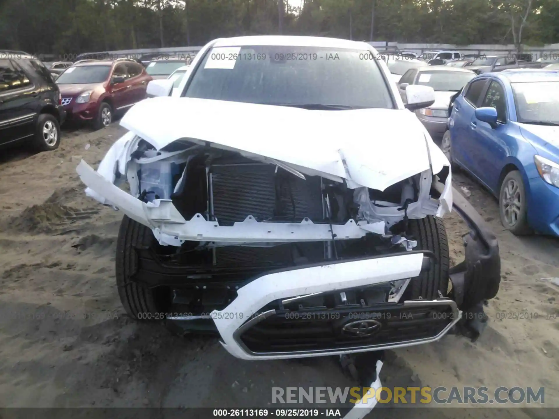 6 Photograph of a damaged car 5TFAX5GN4KX133871 TOYOTA TACOMA 2019