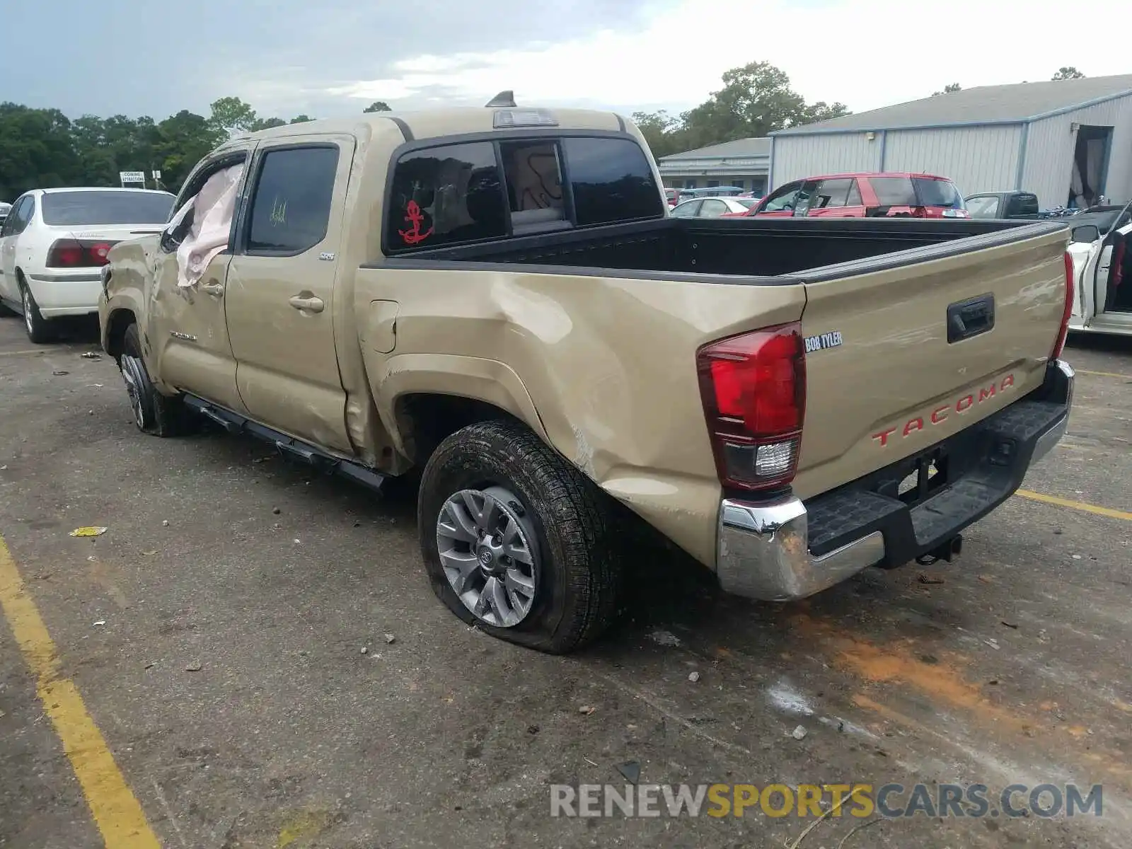 3 Photograph of a damaged car 5TFAX5GN4KX134552 TOYOTA TACOMA 2019