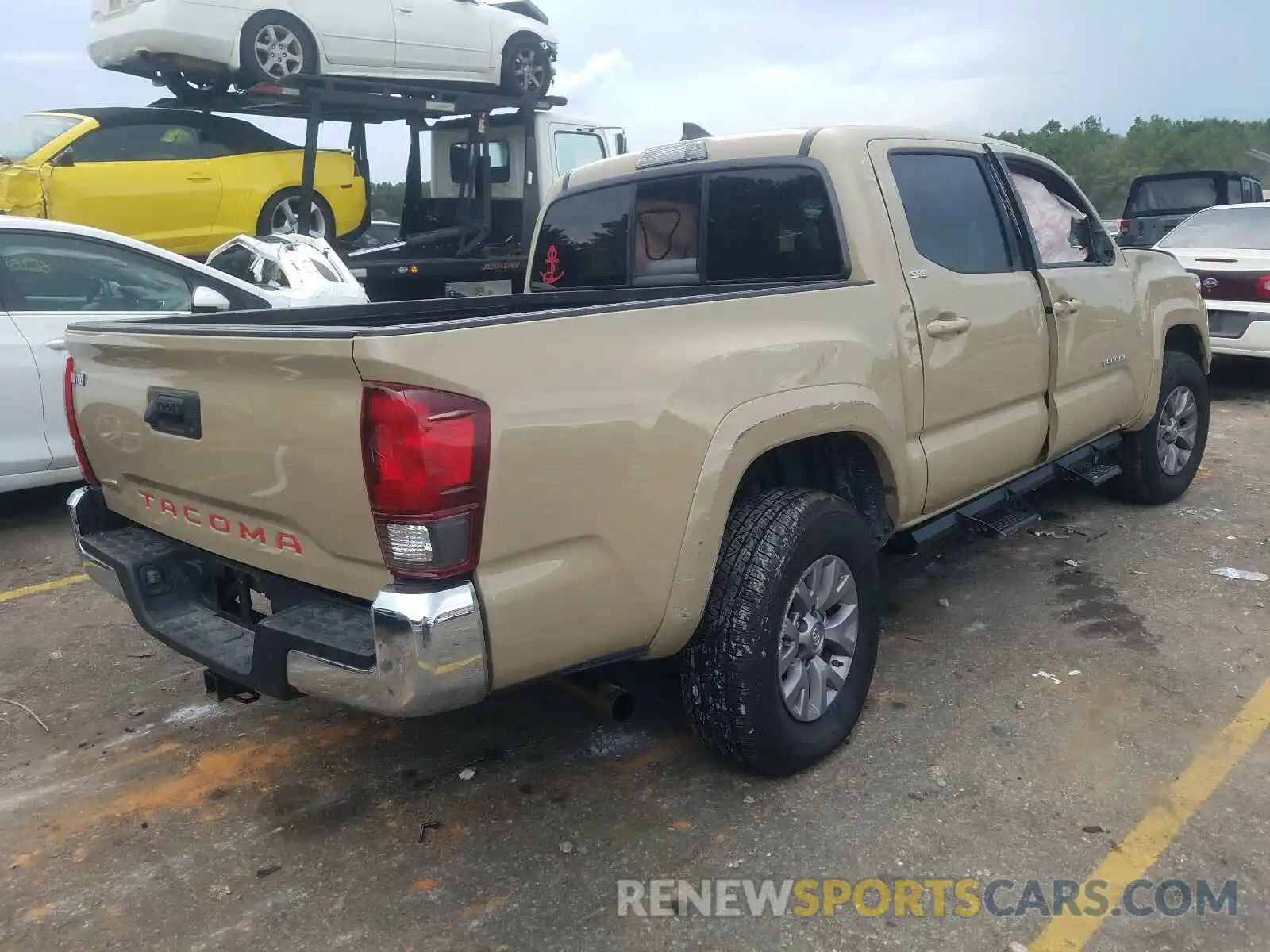 4 Photograph of a damaged car 5TFAX5GN4KX134552 TOYOTA TACOMA 2019