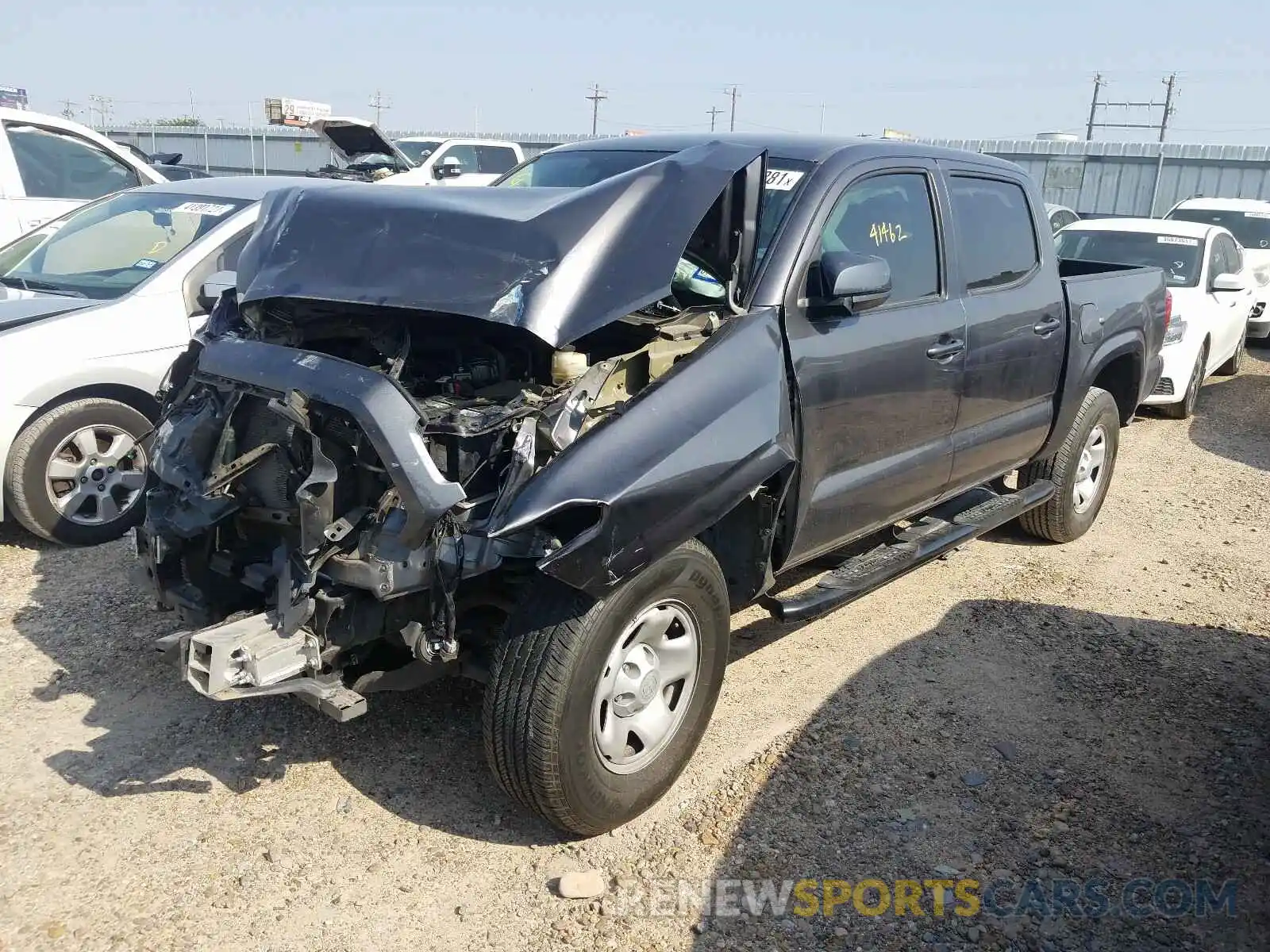 2 Photograph of a damaged car 5TFAX5GN4KX135250 TOYOTA TACOMA 2019