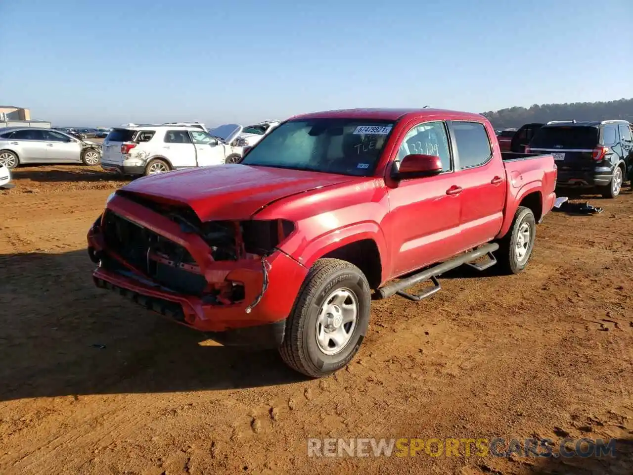 2 Photograph of a damaged car 5TFAX5GN4KX138794 TOYOTA TACOMA 2019