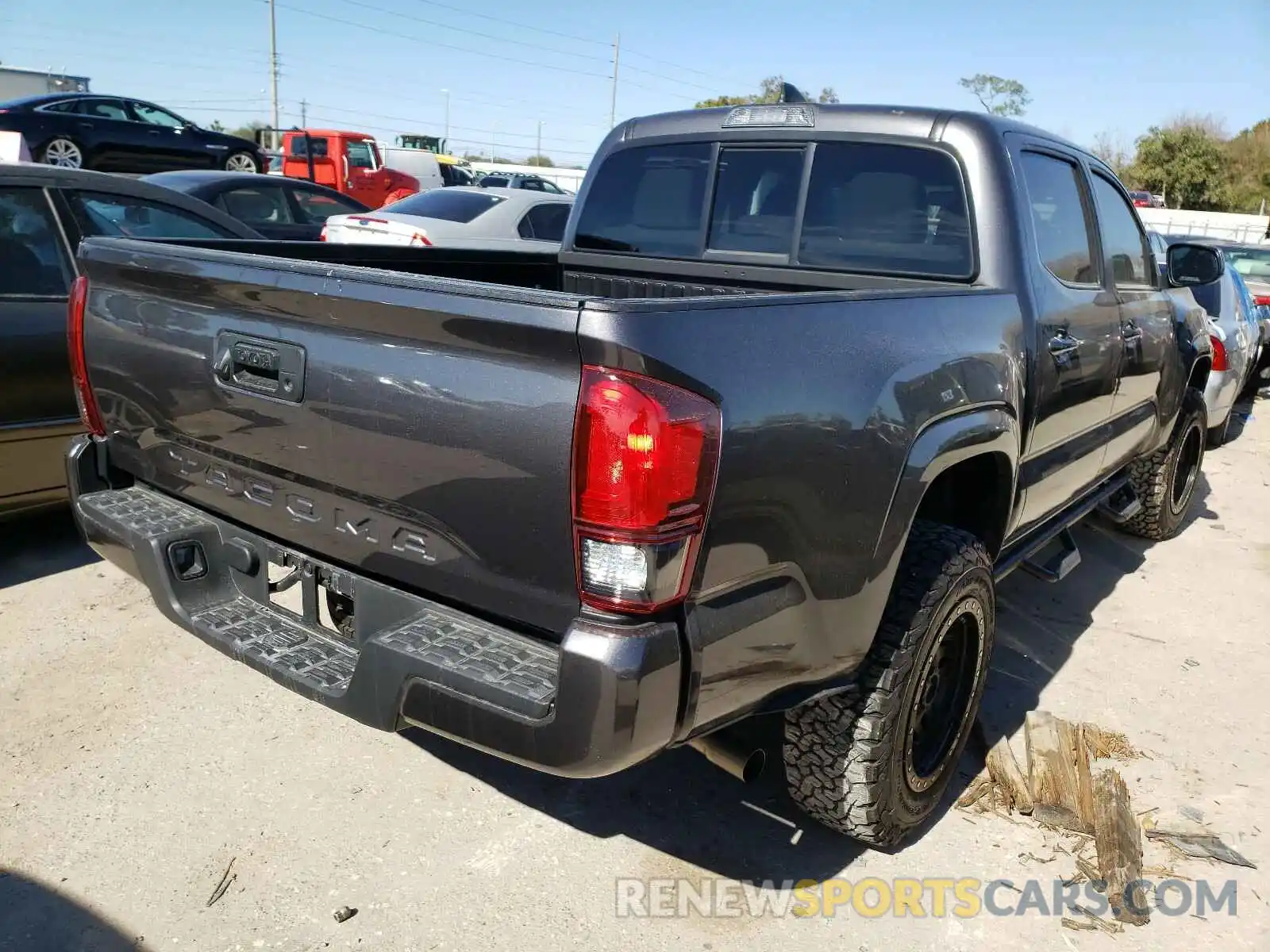 4 Photograph of a damaged car 5TFAX5GN4KX139864 TOYOTA TACOMA 2019