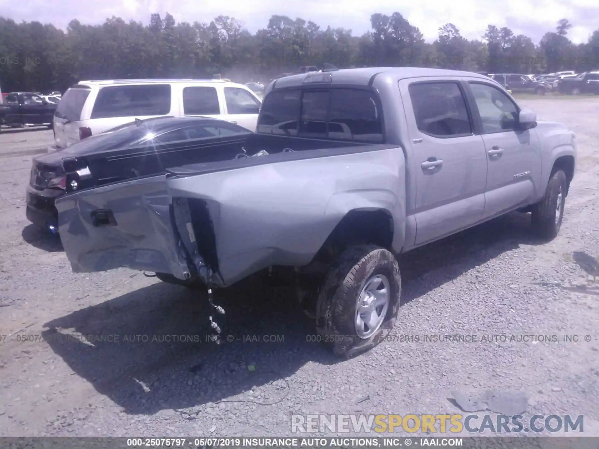 4 Photograph of a damaged car 5TFAX5GN4KX143543 TOYOTA TACOMA 2019