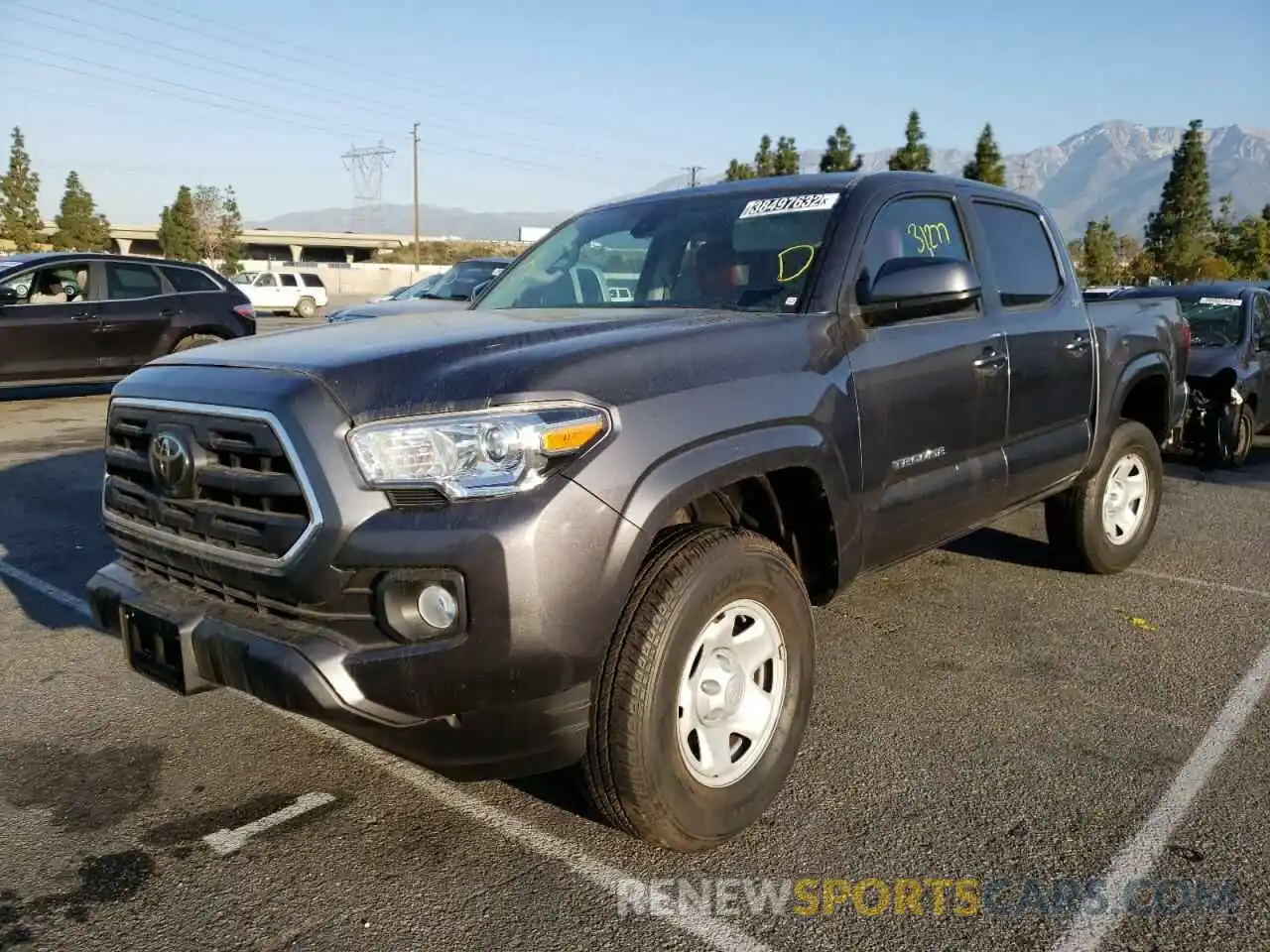 2 Photograph of a damaged car 5TFAX5GN4KX148810 TOYOTA TACOMA 2019