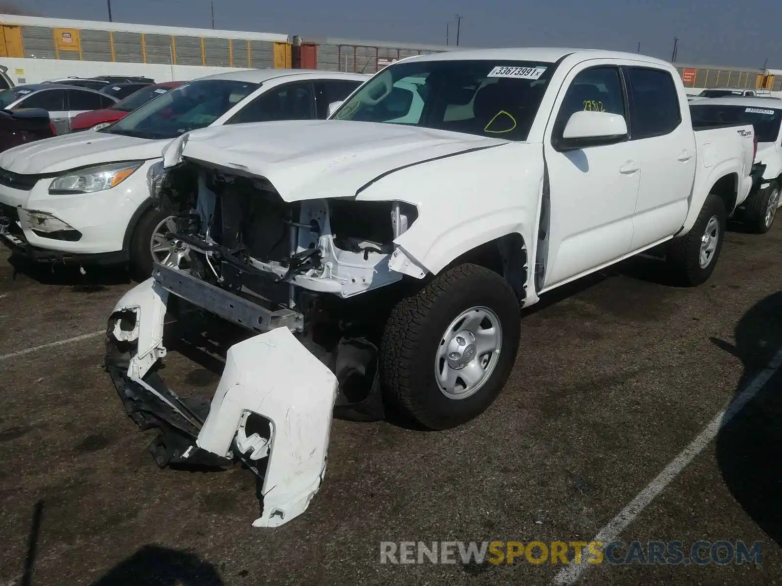 2 Photograph of a damaged car 5TFAX5GN4KX149259 TOYOTA TACOMA 2019