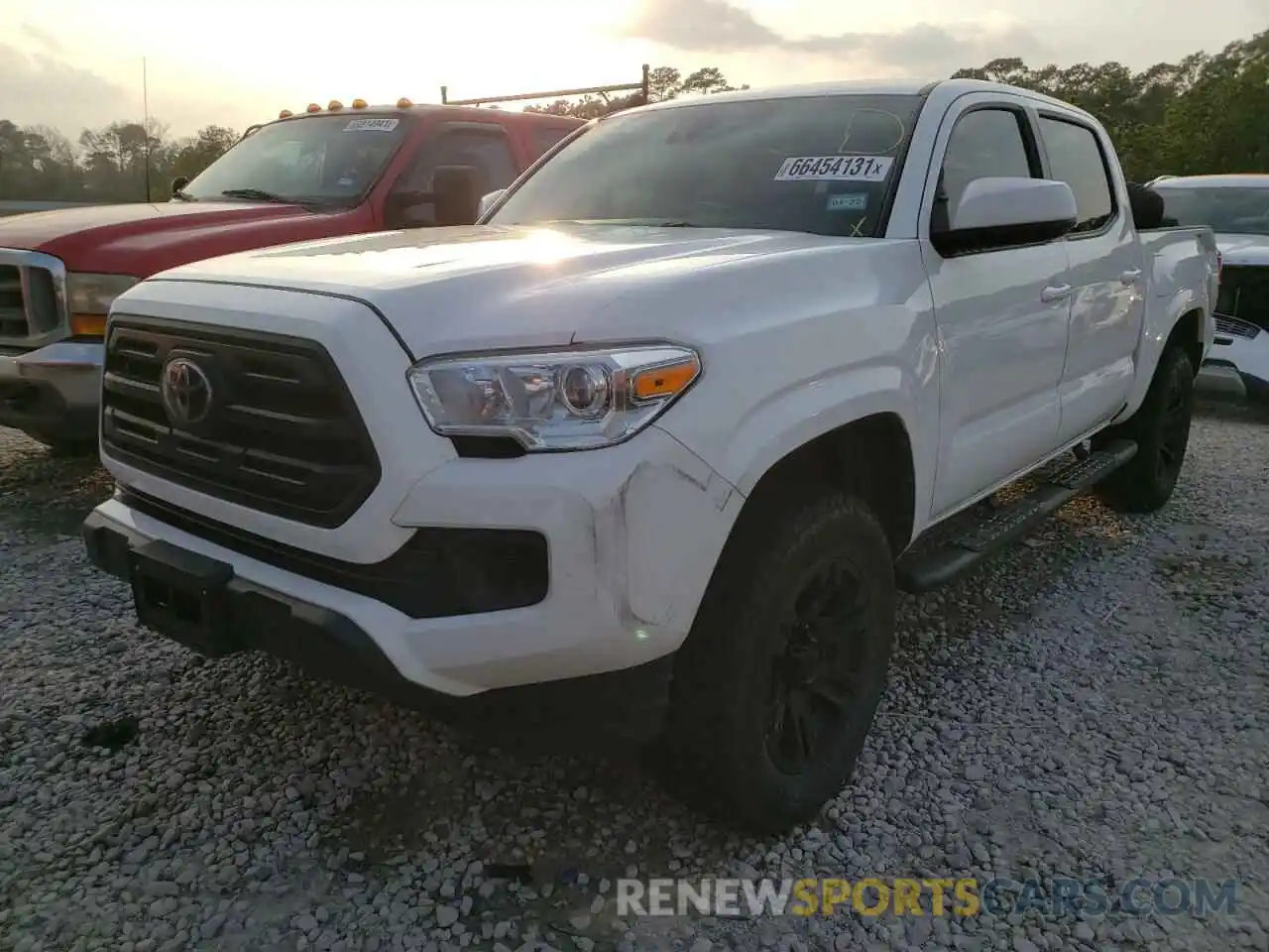 2 Photograph of a damaged car 5TFAX5GN4KX149939 TOYOTA TACOMA 2019