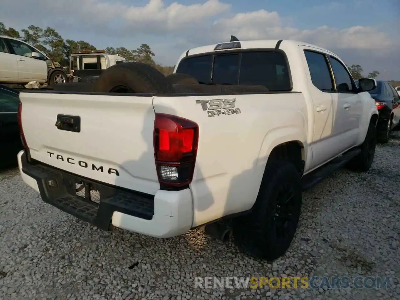 4 Photograph of a damaged car 5TFAX5GN4KX149939 TOYOTA TACOMA 2019