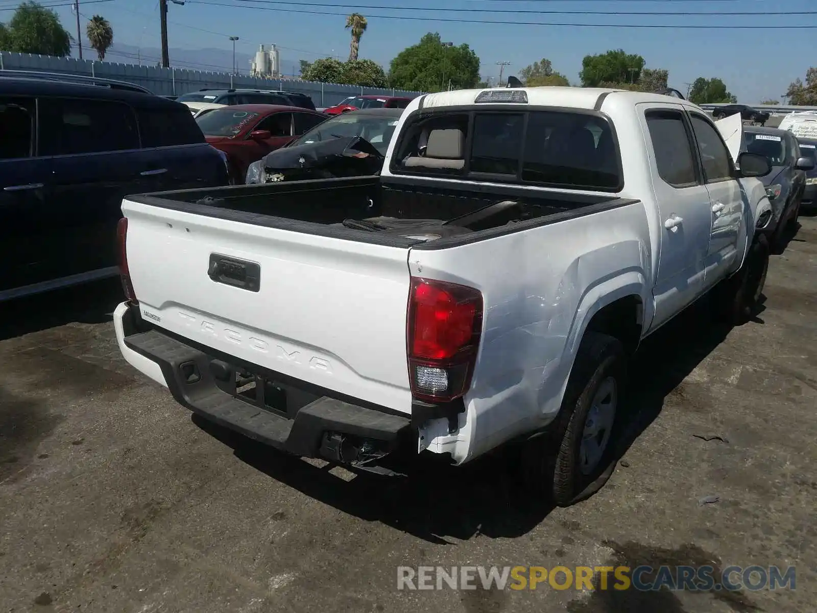 4 Photograph of a damaged car 5TFAX5GN4KX150069 TOYOTA TACOMA 2019