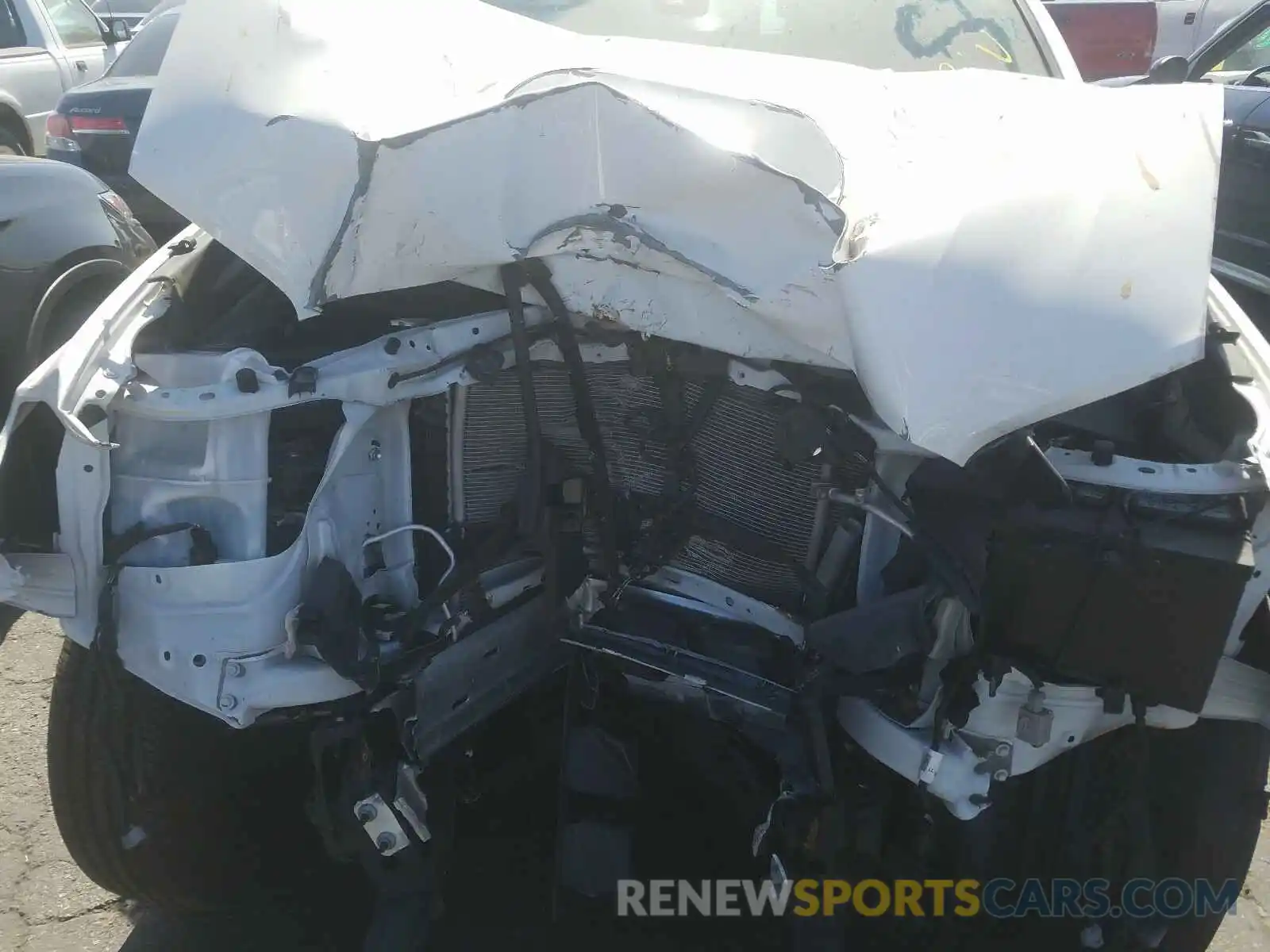 7 Photograph of a damaged car 5TFAX5GN4KX150069 TOYOTA TACOMA 2019