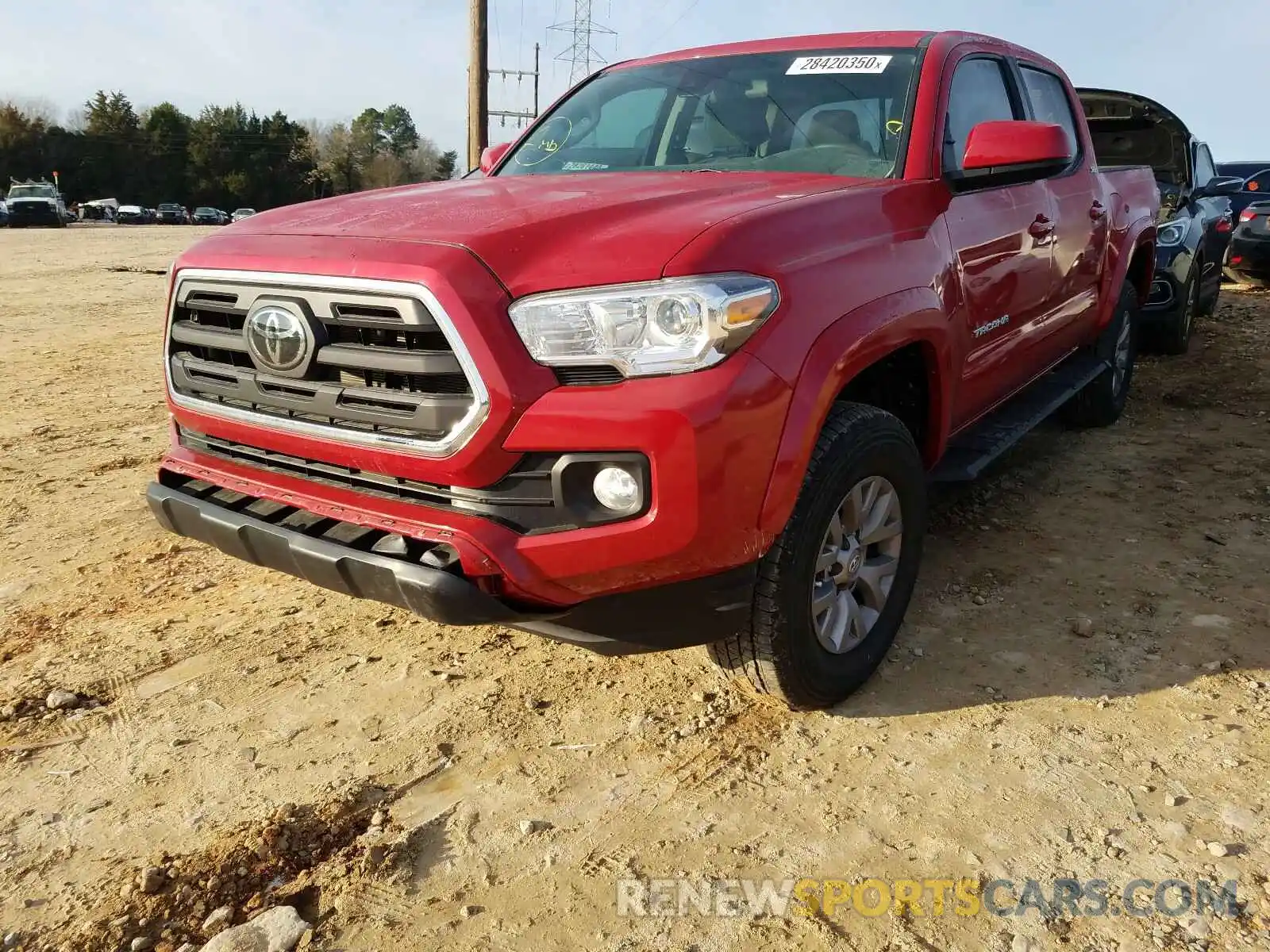 2 Photograph of a damaged car 5TFAX5GN4KX153215 TOYOTA TACOMA 2019